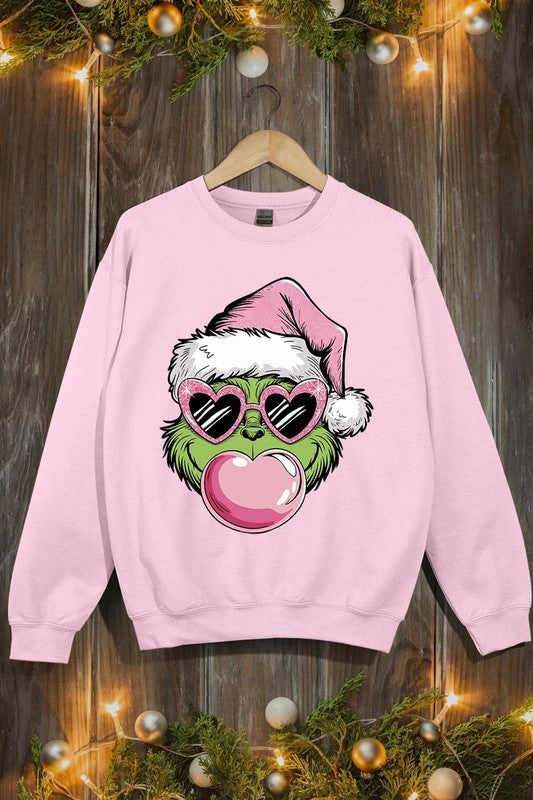 Pink Blowing Bubble Grinch Graphic Sweatshirt – Add Some Grinchy Fun to Your Wardrobe