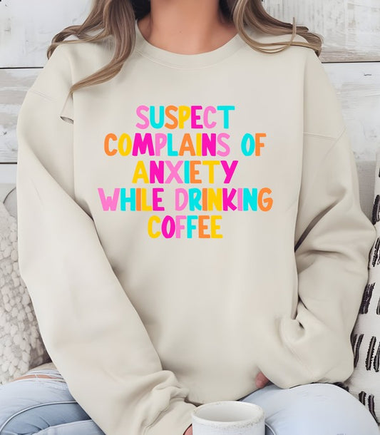 “Suspect Complains of Anxiety While Drinking Coffee” Crew Sweatshirt – Caffeine Chaos in Comfort ☕✨